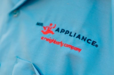 Mr. Appliance logo on a repairman’s shirt